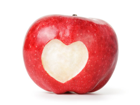 heart carved on an red apple