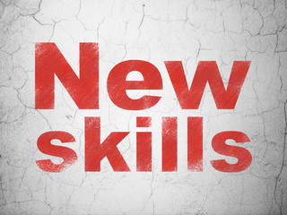 Fototapeta premium Education concept: New Skills on wall background