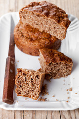 sliced fresh buns and knife