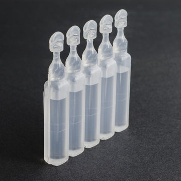 Vials containing physiological serum