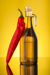 olive oil bottle and red paprika