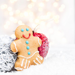 Christmas card with Gingerbread Man cookie, festive decorations
