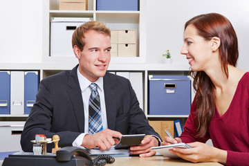 Woman talking to tax consultant