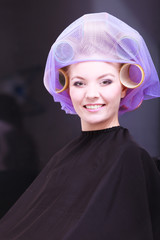 Blond girl hair curlers rollers hairdresser beauty salon