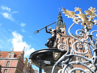 Neptune Fountain and city hall in Gdansk, Poland © Voyagerix
