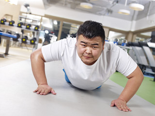 overweight man exercising