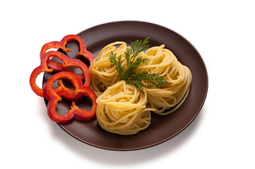 dish with spaghetti and pepper