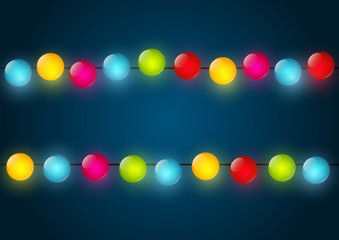Christmas light bulbs on blue
