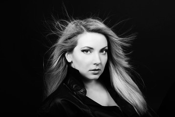 Beautiful girl blonde in  black shirt