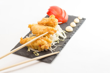fried chicken fillet with vegetables isolated