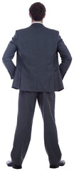 Businessman standing with hands on hips