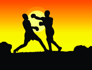 Silhouette of the boxing at sunset.
