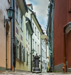 Fototapeta na wymiar Narrow medieval street in the old Riga city, Latvia, Europe