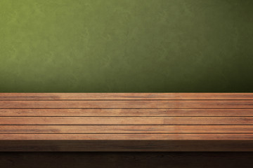 Old wooden table with green background