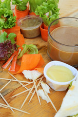 Salad vegetables - carrots, rolls to crab with coffee.