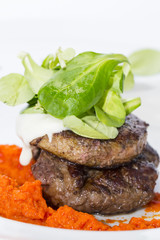 baked meat in a sauce of peppers and tomatoes