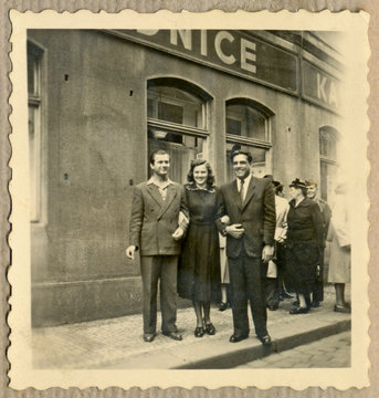 CIRCA 1955 - friends before old Prague pub