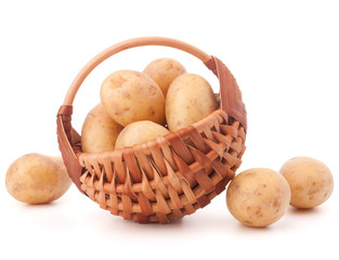 Potato tuber  in wicker basket isolated on white background