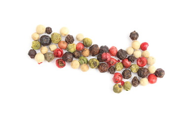 Colored pepper arranged in shape of an arrow