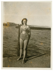 Beauty in a two-piece swimsuit (bikini) - circa 1950
