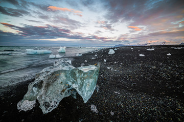Black Beach with Icebergs at sunrise, Jokulsarlon Lake, Iceland