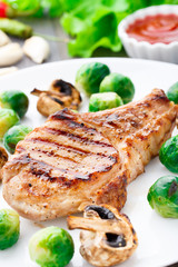 Grilled pork chop with brussels sprouts