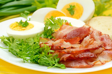 Breakfast with bacon and eggs