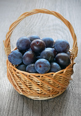 Plums in basket