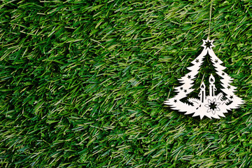 Christmas tree decoration on green fir background