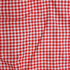 Abstract background texture of a red and white fabric