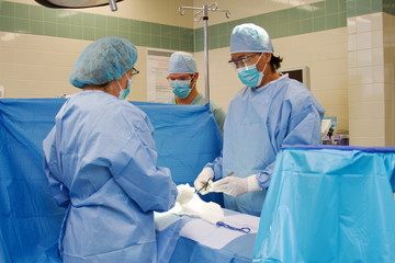Surgical suite with health team