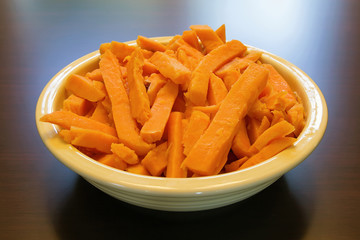Sweet Potato Spears Bowl on Wood Table