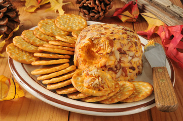 Cheddar cheese ball with crackers
