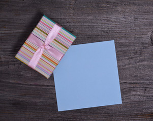 Small box with blank blue paper
