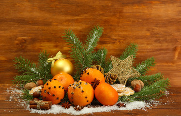 christmas composition with oranges and fir tree,