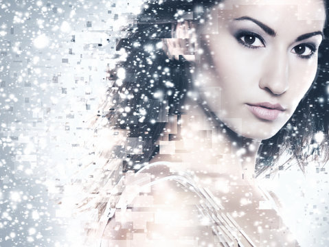 Abstract portrait of a young and beautiful woman in snow