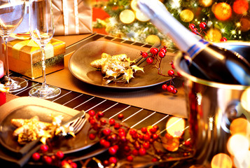 Christmas And New Year Holiday Table Setting with Champagne