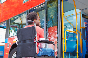 Disabled Woman In Wheelchair Boarding Bus © Monkey Business