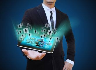 businessman holding tablet technology business concept