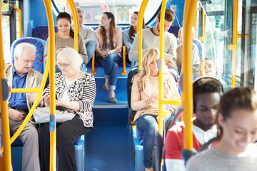 Interior Of Bus With Passengers - obrazy, fototapety, plakaty