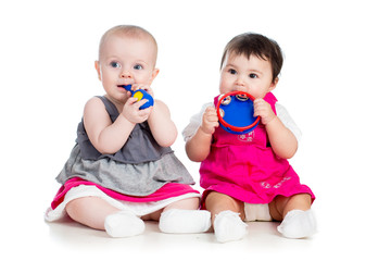 Funny babies girls  with musical toys © Oksana Kuzmina