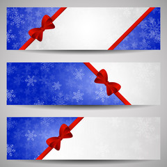 Three winter banners with snowflakes and red ribbon on blue, pla