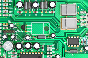 Close up of a printed green computer circuit board