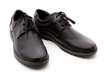 black, man's shoes on a white background