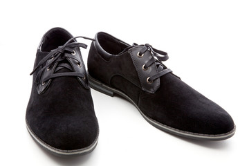 black, man's shoes on a white background