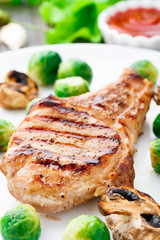 Grilled pork chop with brussels sprouts