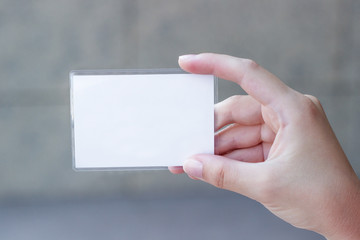 Obraz premium Blank card in a woman's hand