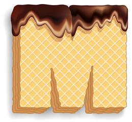 Letter M consisting of wafers with chocolate cream