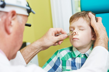 Little boy at ear nose thoat doctor