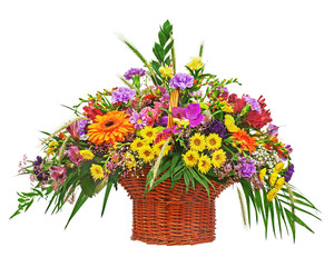 Flower bouquet arrangement centerpiece in wicker basket isolated